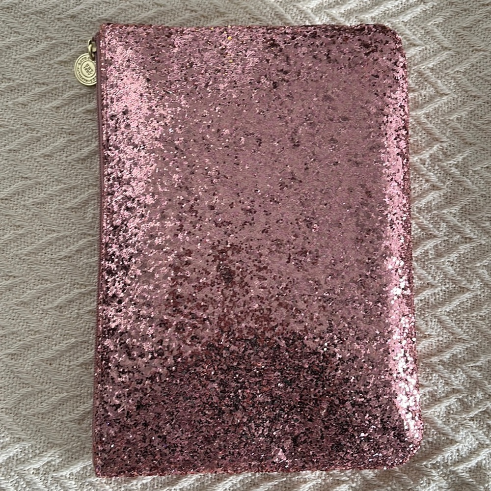 Bath and Bodywork’s pink sparkle cosmetic pouch